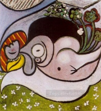  in - Nude lying with flowers 1932 Pablo Picasso